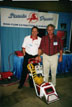 Mike Downey proudly pose with their Steamin Demon Portable carpet extractor